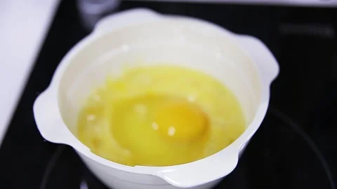 Crack an egg and stir it up Stock Footage 295497835