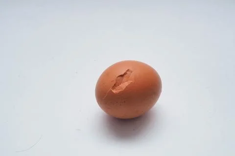 Crack Egg for cooking Stock Photos