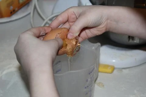 Crack an egg Stock Photos