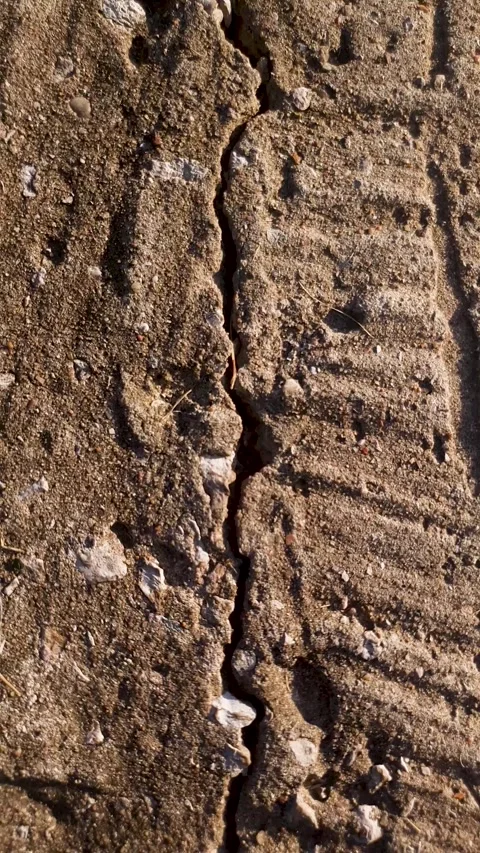 Crack, gap, or split in a concrete surface or slab vertical Stock Footage 347606659