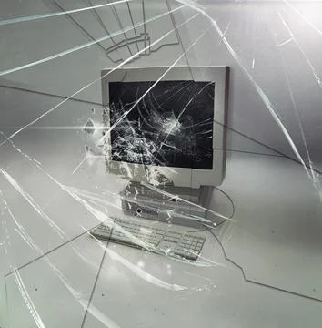 Crack, glass and isolated desktop computer with problem, destruction and vintage Stock Photos