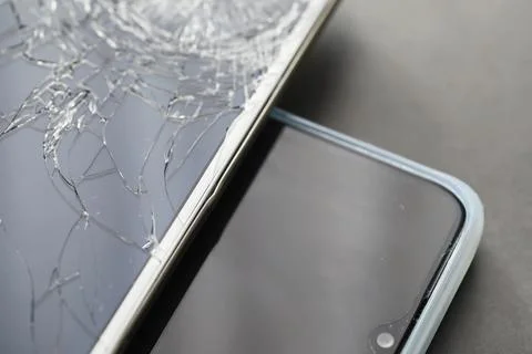 Crack on the glass. Broken screen. Broken phone. Cracked glass background. .. Stock Photos
