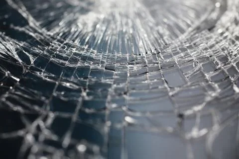 Crack on the glass. Broken screen. Broken phone. Cracked glass background. .. Stock Photos
