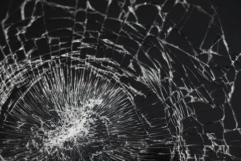 Crack on the glass. Broken screen. Broken phone. Cracked glass background. .. Stock Photos