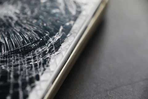 Crack on the glass. Broken screen. Broken phone. Cracked glass background. .. Stock Photos