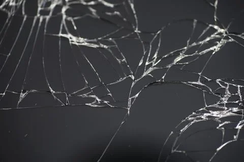 Crack on the glass. Broken screen. Broken phone. Cracked glass background. .. Stock Photos