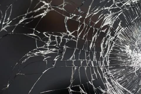 Crack on the glass. Broken screen. Broken phone. Cracked glass background. .. Stock Photos