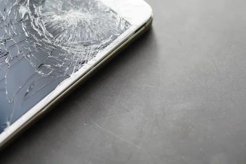 Crack on the glass. Broken screen. Broken phone. Cracked glass background. .. Stock Photos