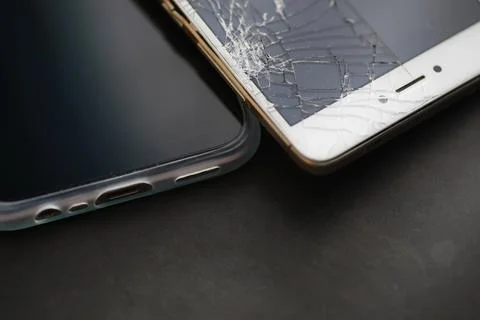 Crack on the glass. Broken screen. Broken phone. Cracked glass background. .. Stock Photos
