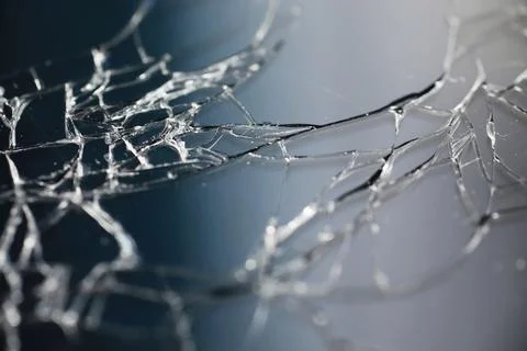 Crack on the glass. Broken screen. Broken phone. Cracked glass background. Wh Stock Photos