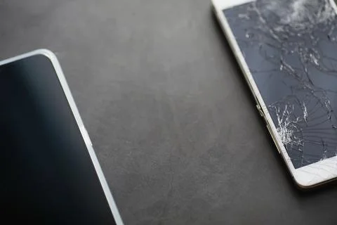 Crack on the glass. Broken screen. Broken phone. Cracked glass background. .. Stock Photos