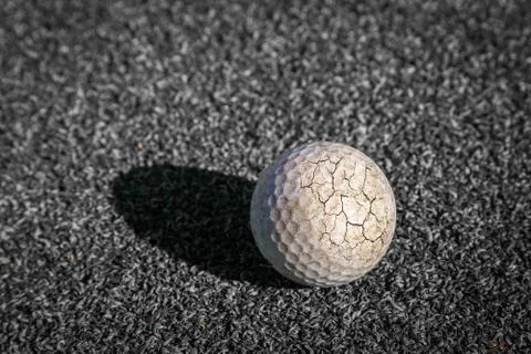 Crack golf ball Stock Photos