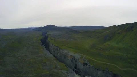 Crack in the ground over tectonic plates. Iceland. 4k Stock Footage 82899138