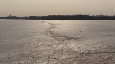 Crack In Icy frozen Surface. Spring floating of ice. Melting Stock Footage 36543471