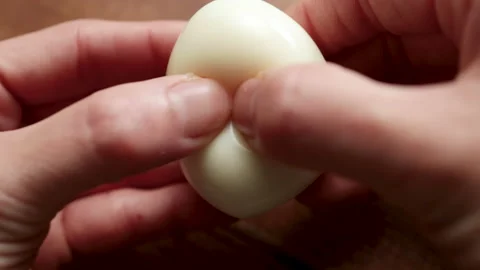 Crack Open Boiled Egg Video stock 169133011