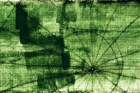 Crack pattern on broken green glass surface Stock Photos