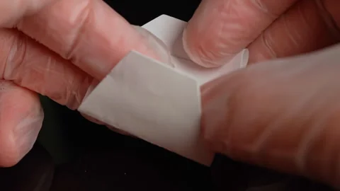 Crack Pipe Screen for smoking crack cocaine. Screen holds the rock of crack.. Stock Footage 323566957