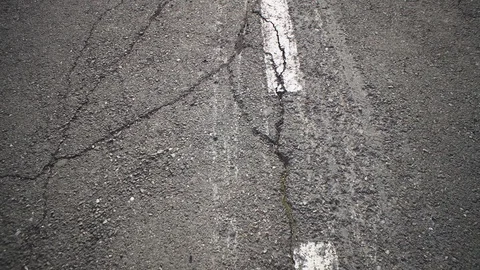 Crack of roadway surface on the old carriageway. Stock Footage 107818491