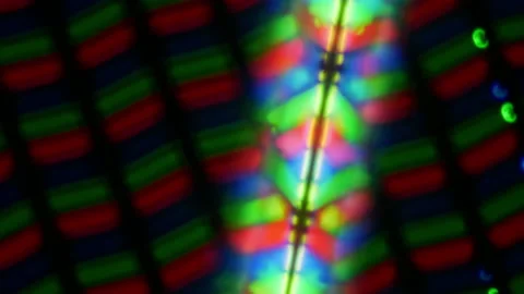 Crack on smartphone display. Broken LSD matrix tricolor. View under the microsco Stock Footage 235558653