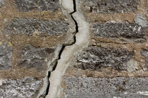 Crack in the stone wand Stock Photos