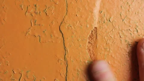 Crack in the wall close-up. Cracked wall plaster and paint. Stock Footage 173326559