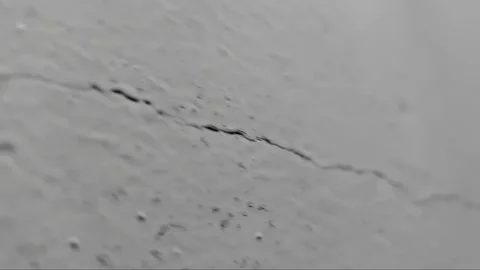 Crack on the wall. Crack on the surface. Stock Footage 153465116
