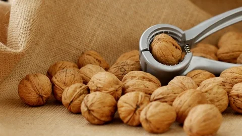 Crack the walnuts,4k Close up shot, Slide equipment used.RL pan, Right slider  Stock Footage 85159409