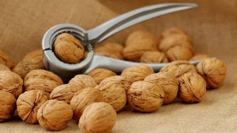 Crack the walnuts,4k Close up shot, Slide equipment used.RL pan, Right slider  Stock Footage 85159787
