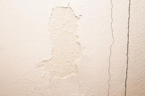 Crack in the white wall. Stock Photos