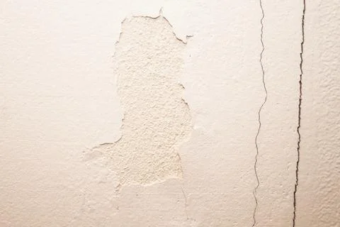 Crack in the white wall. Stock Photos