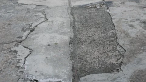 Cracked and Repaired Concrete Surface Background Stock Footage 340880264