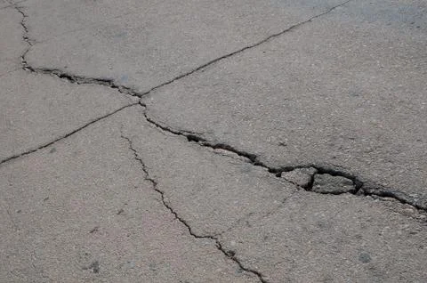 Cracked asphalt Stock Photos