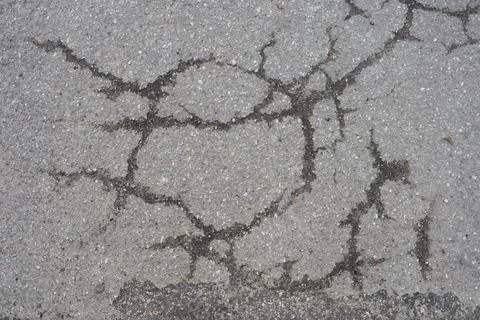 Cracked asphalt texture Stock Photos