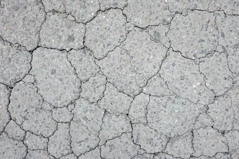 Cracked asphalt texture Stock Photos