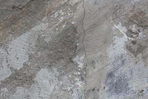 Cracked background with different cement layers of gray color palette Stock Photos