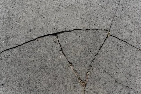 Cracked basalt stone texture background, grey volcanic lava paving slabs Stock Photos