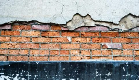 Cracked brick wall Foto stock