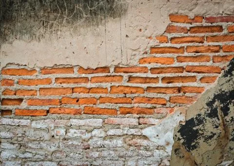 Cracked brick wall Stock Photos
