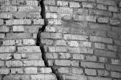 Cracked brick wall Stock Photos