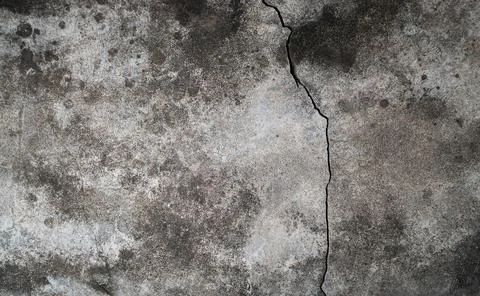 Cracked cement damage wall texture background. Stock Photos
