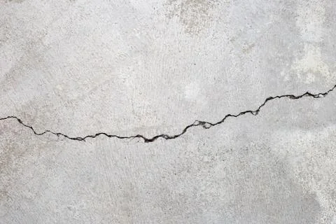 Cracked cement floor texture background. Stock Photos
