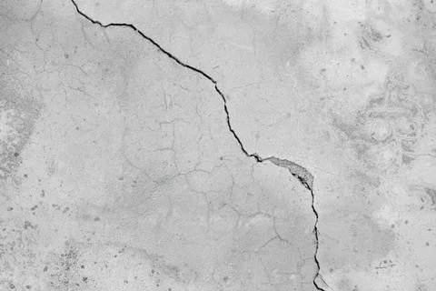 Cracked concrete wall with rough texture and lines Stock Photos