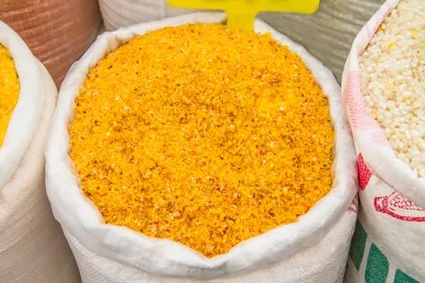 Cracked corn kernels in a sack Stock Photos