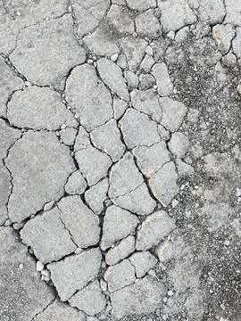 Cracked Dry Concrete Texture Background, Weathered Gray Surface Stock Photos