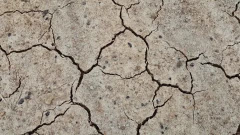 Cracked Dry Soil Ground Texture Due To Drought Top Down Overhead Close Up View Stock Footage 342015910