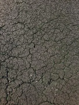 Cracked dry soil surface close-up Stock Photos