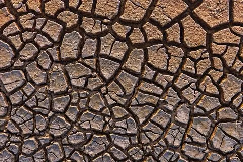 Cracked Earth Pattern Texture as nature abstract background Foto stock