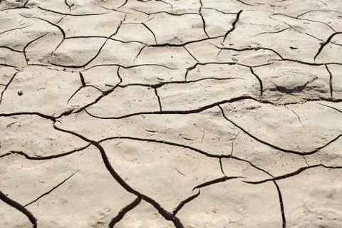 Cracked earth surface Stock Photos