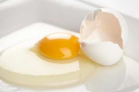 Cracked egg Stock Photos