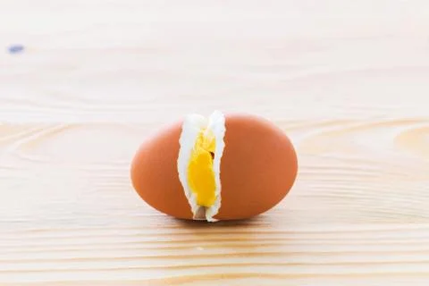 Cracked eggs in the middle Stock Photos